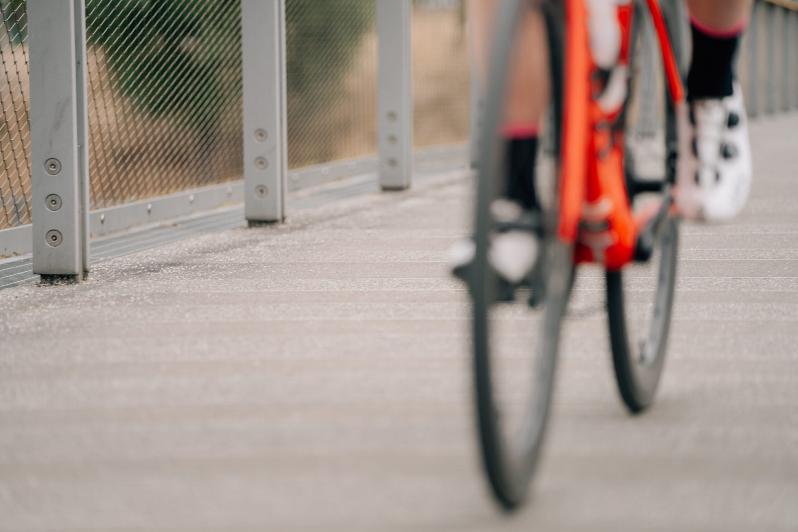 close up of out of focus bicycle wheels